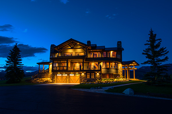 Night view of custom log cabin Mt Crested Butte