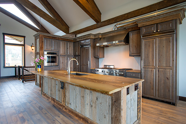 Custom Crested Butte Home Builder Cedar Rdige Construction used reclaimed wood in this Buckhorn Ranch Kitchen